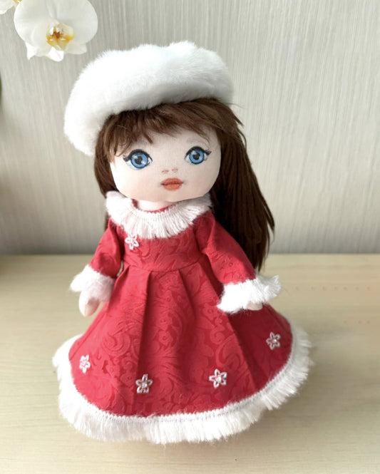 Textile doll with Christmas outfit