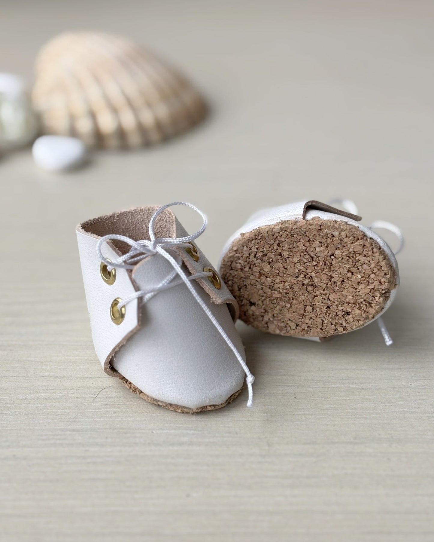 Chaussures de poupée