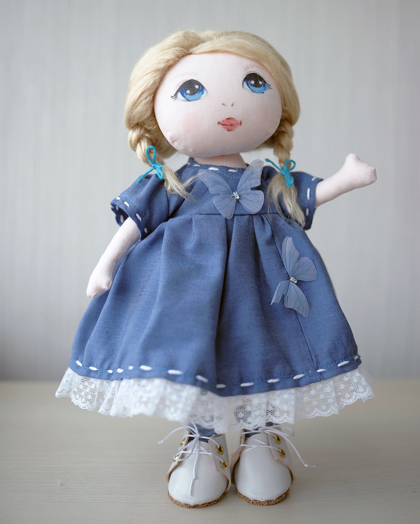 Blonde textile doll