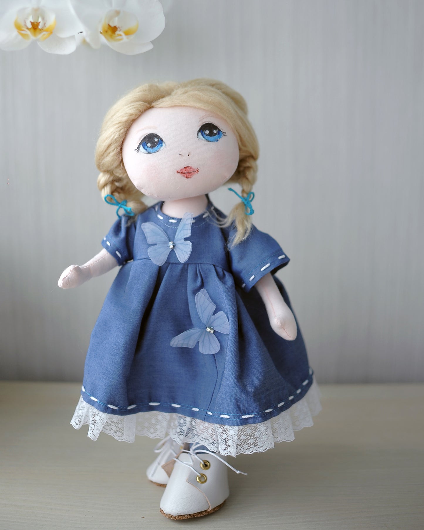 Blonde textile doll