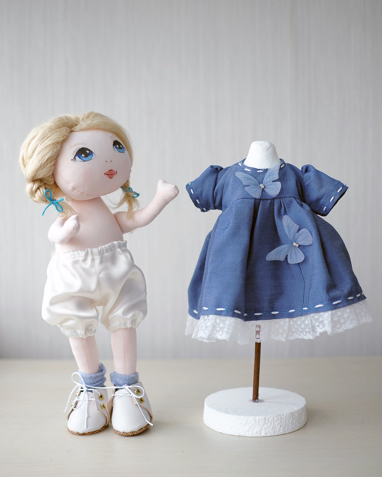 Blonde textile doll