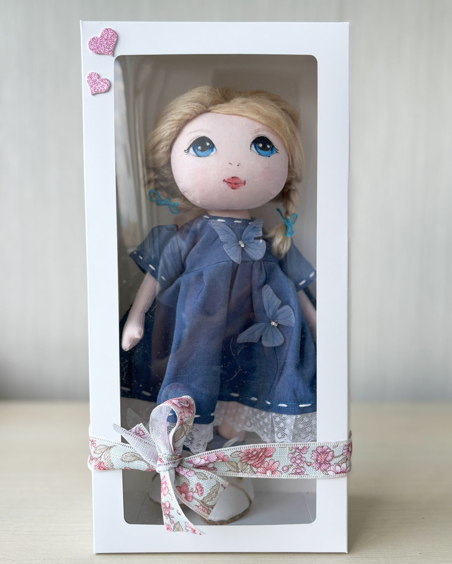 Blonde textile doll