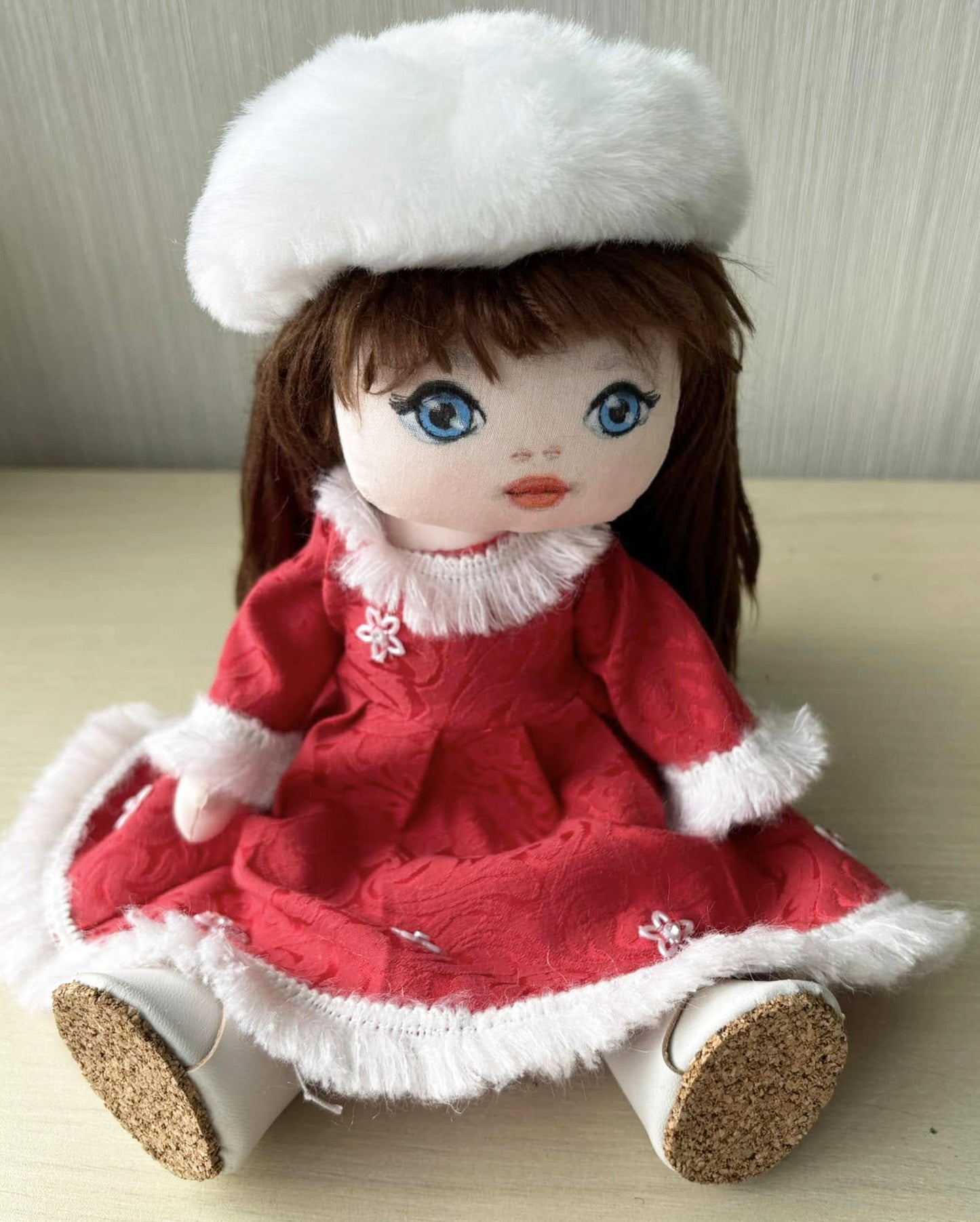 Textile doll with Christmas outfit