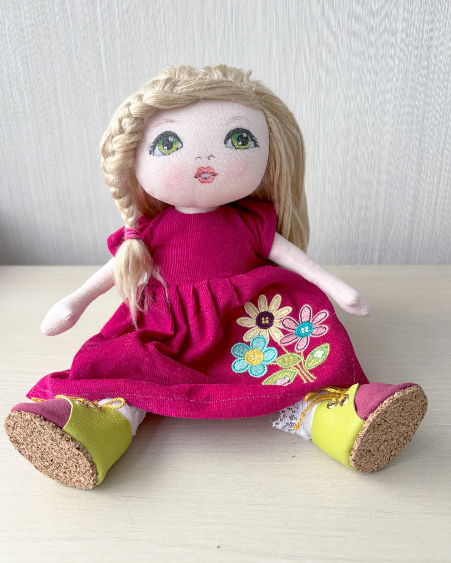 Blonde textile doll