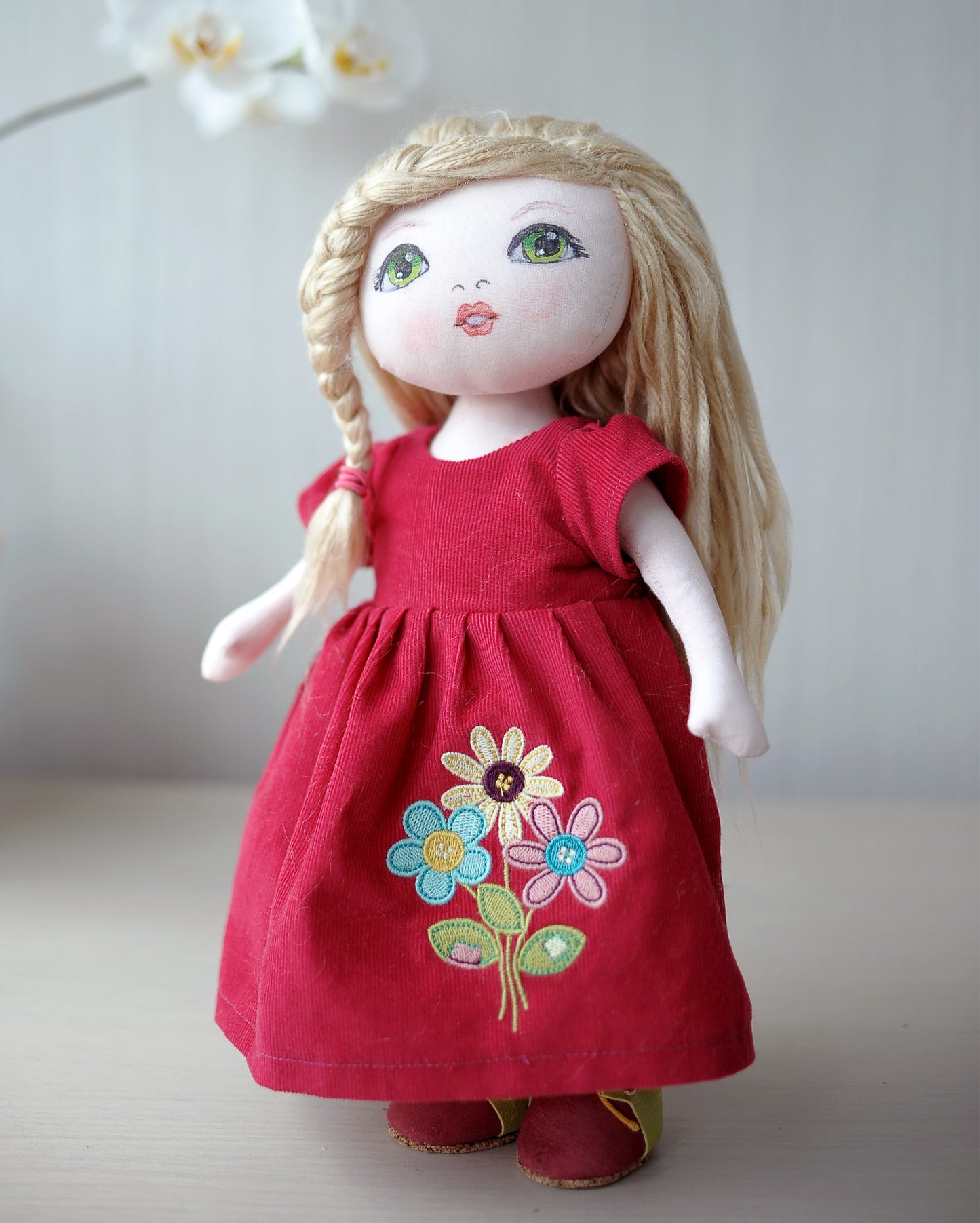 Blonde textile doll