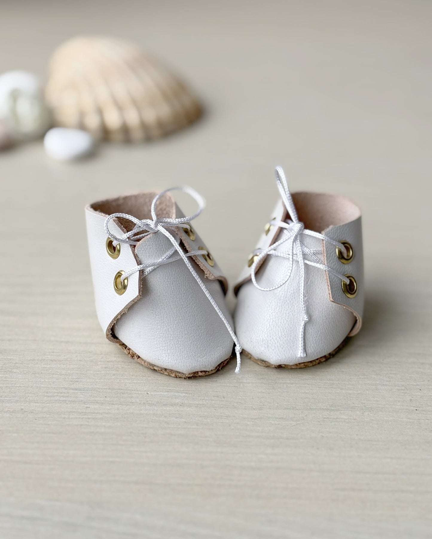 Chaussures de poupée