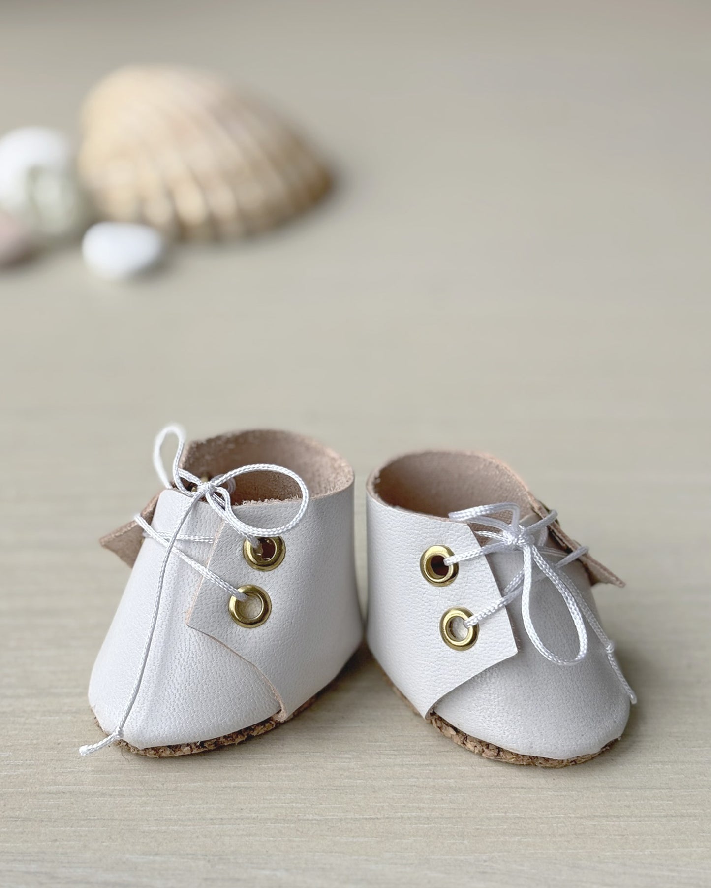 Chaussures de poupée